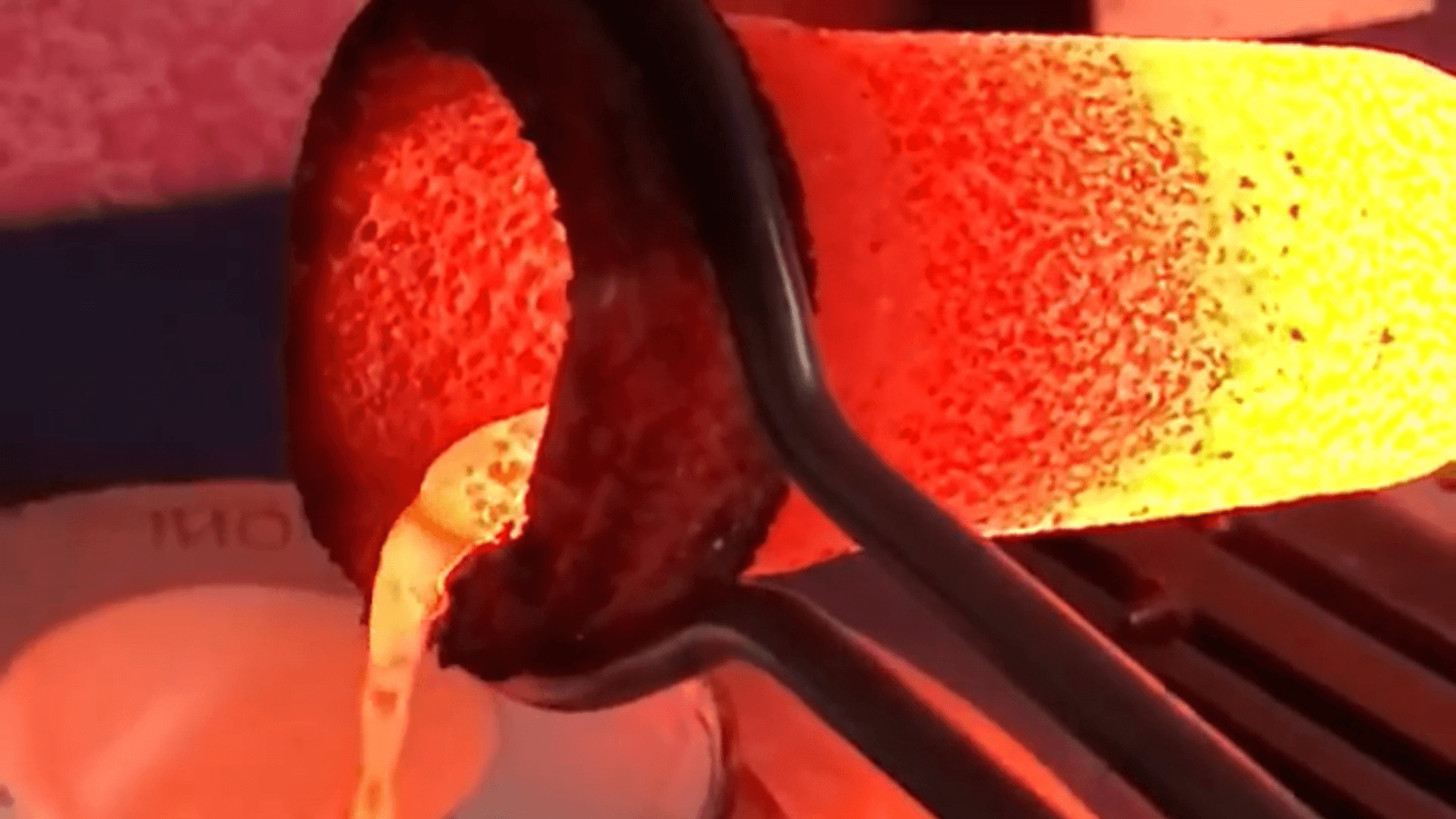 Molten metal pouring in foundry